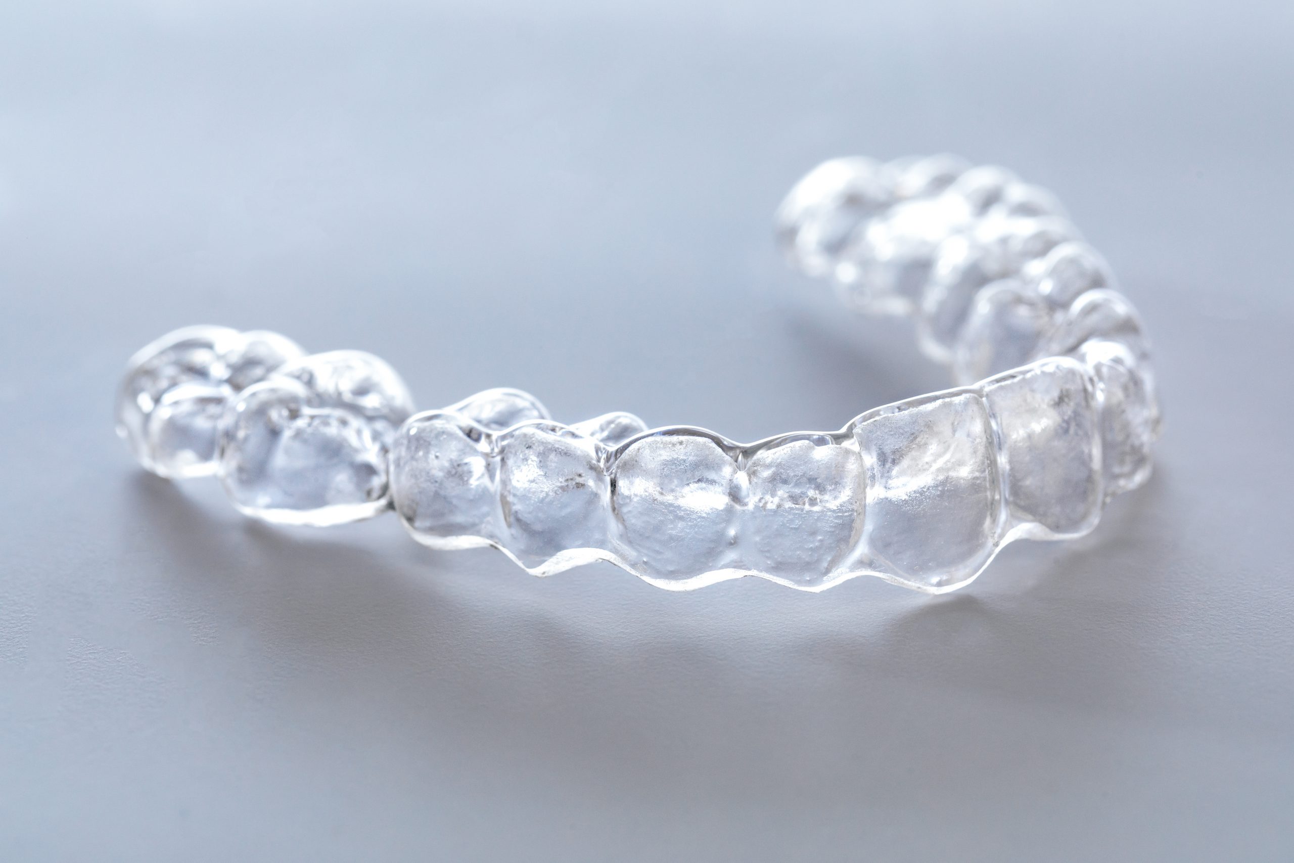 Inivisalign braces or aligner. A way to have a beautiful smile and white teeth.